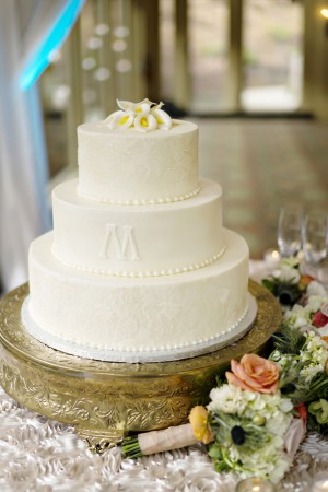 Cream wedding cake -Andie Freeman Photography