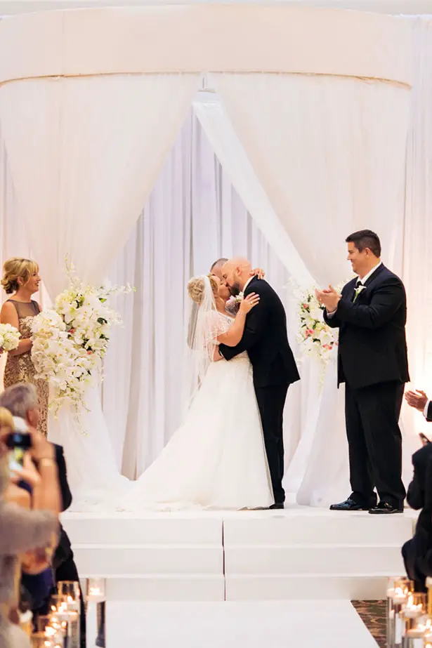Wedding first kiss - Clane Gessel Photography