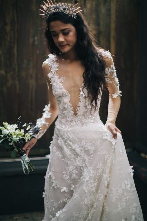 Deep v-neck and lace wedding dress -Erika Layne Photography