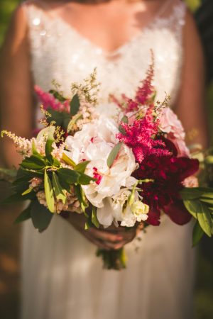 Red and pink bridal bouquet - Sam Hurd Photography