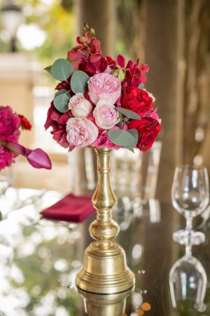 Red, pink and gold wedding centerpiece - Cary Diaz Photography