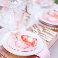 Pink wedding table with Weddding favors - Caroline Ross Photography
