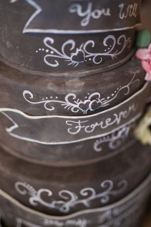 Chalkbored wedding cake - Gideon Photography