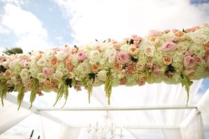 Pink wedding ceremony flowers - Anna Kim Photography