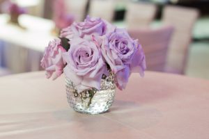 Purple rose wedding centerpiece - Ace Cuervo Photography