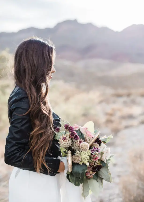 Bride wearing a leather jacket - Coffee Creative Photography