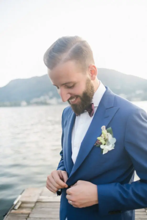 Groom in blue suite and maroon bowtie - Photography: Irene Fucci