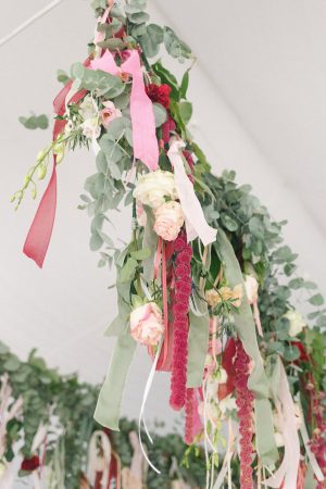 Ribbon and greenery hanging wedding decor - Photography: Irene Fucci