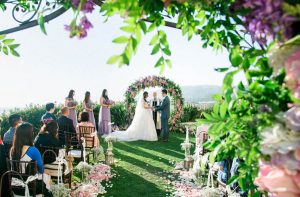 Purple Wedding Ceremony - Donna Lams Photo
