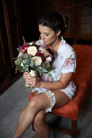 Bride getting ready for wedding day photo - Tab McCausland Photography