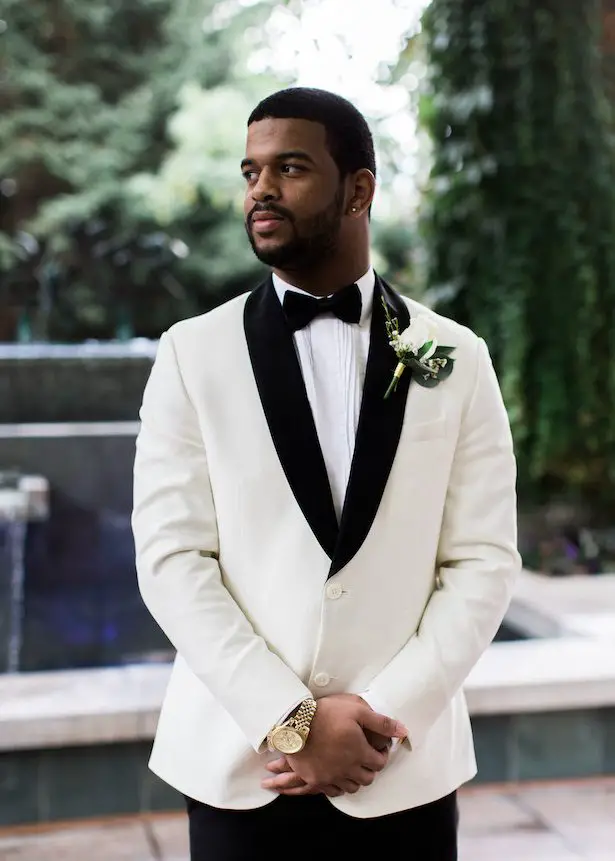 Groom in white tux - Alexandra Knight Photography