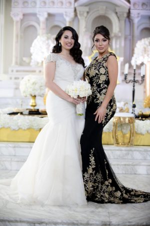 Black White and Gold Glamorous Bridesmaid dress - Photo: Hollywood Pro Weddings