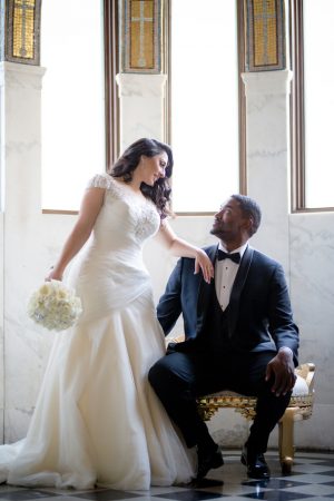 Black and White Glamorous WeddingGroom boutonniere wedding - Photo: Hollywood Pro Weddings