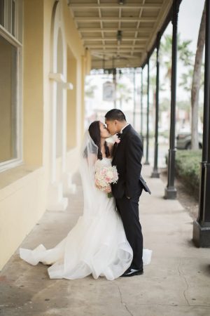 Romantic wedding photo kiss - Brooke Images
