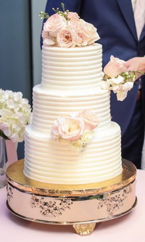 Simple and elegant buttercream wedding cake with flowers - Lifelong Photography Studio