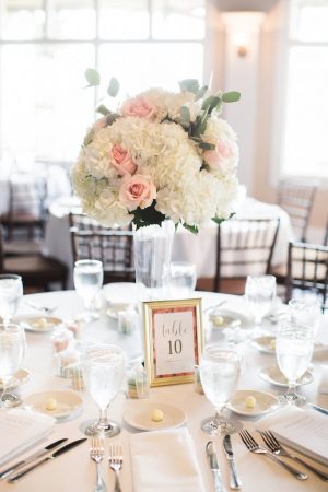 Tall wedding center piece with white hydrangeas and pink roses - Brooke Images
