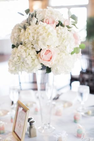 Tall wedding centerpiece with white hydrangeas and pink roses - Brooke Images
