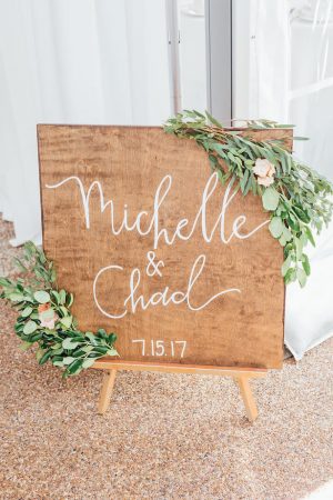 Wood wedding sign with greenery and flowers - Rachel Figueroa Photography