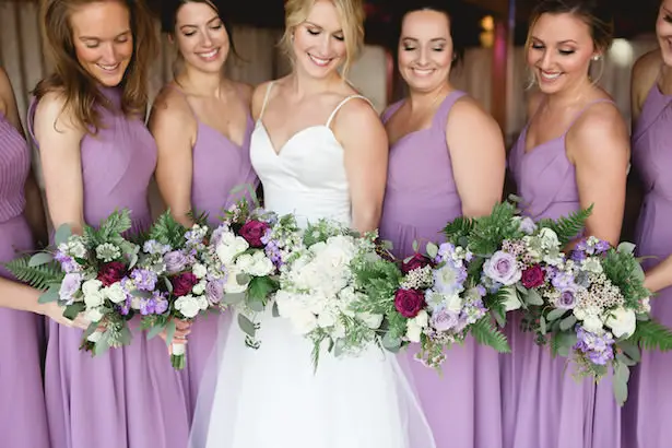 Lilac mismatched long bridesmaid dresses and bouquets - Photography: Rochelle Louise