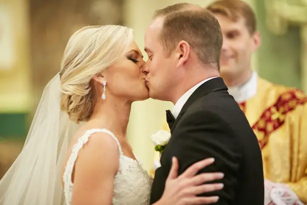 Romantic wedding kiss photo - Wasio Photography