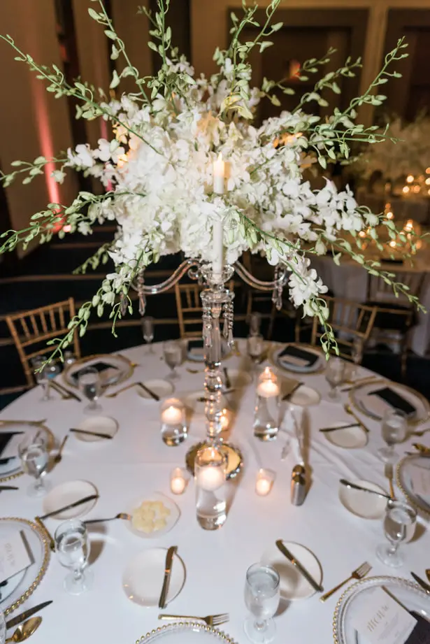 Tall white wedding centerpiece and crystal candelabra - Flashy Mama Photography