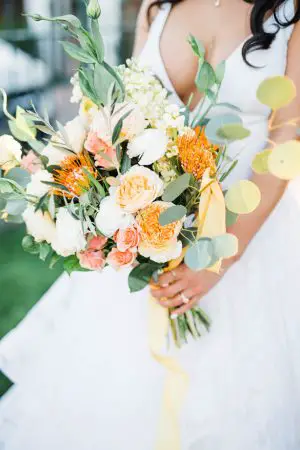 Orange and yellow wild wedding bouquet - M.Hutchison Photography