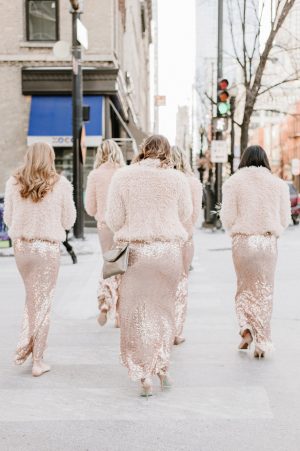 Rose gold long sequin bridesmaid dresses and blush winter wedding coats- Nicole Jansma Photography