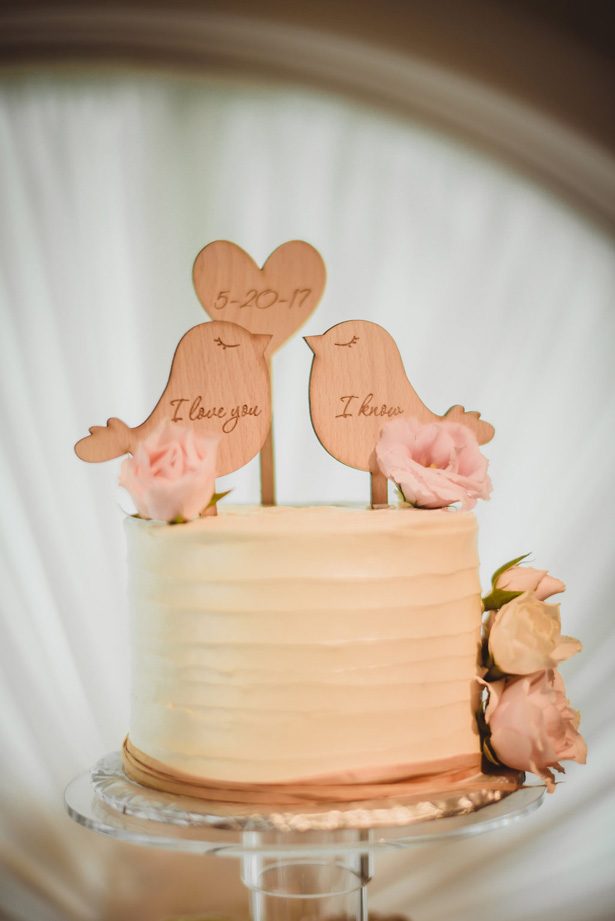 White buttercream wedding cake with bird cake topper- Dani Leigh Photography 