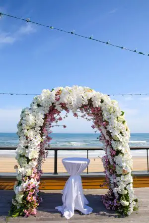Floral Wedding ceremony arch - Photography: Adam Opris