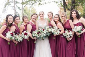 Long mismatched burgundy bridesmaid dresses - Photography by Marirosa
