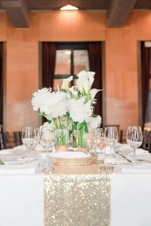 Long wedding tablescape with white and gold wedding centerpieces - 1985 Luke Photography