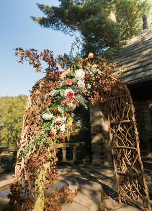 Outdoor rustic wedding ceremony arch - Imagine It Photography