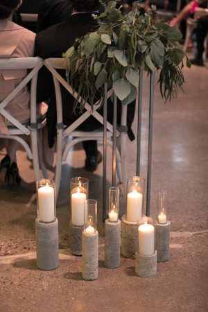 Industrial Glam Wedding Ceremony decor with candles and greenery - Alice Hq Photography