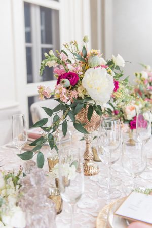 Low wedding centerpiece with peonies and pink flowers - Lynne Reznick Photography