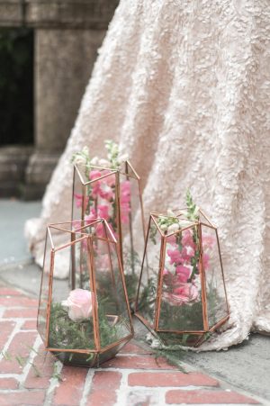 Pink wedding flowers on terrariums - Lynne Reznick Photography