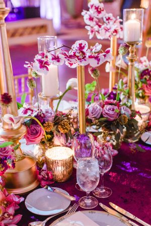 Purple and gold luxury wedding tablescape and floral centerpiece - Melissa Schollaert Photography