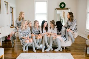 matching bridal party robes and socks - Honey + Bee Photography