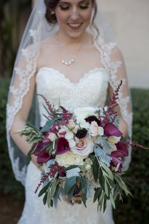 Dark purple and burgundy wild wedding bouquet with white roses and blush flowers- Cat Pennenga Photography