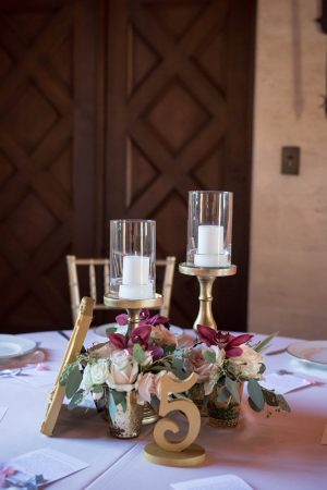 Gold and burgundy low wedding centerpiece- Cat Pennenga Photography