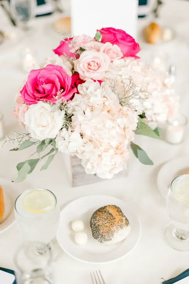Low pink wedding centerpiece with hydrangeas and roses - Photography: Lauren Westra