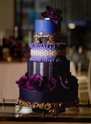 Purple Opulent Wedding cake with gold details and sugar flowers -Sherri Barber Photography