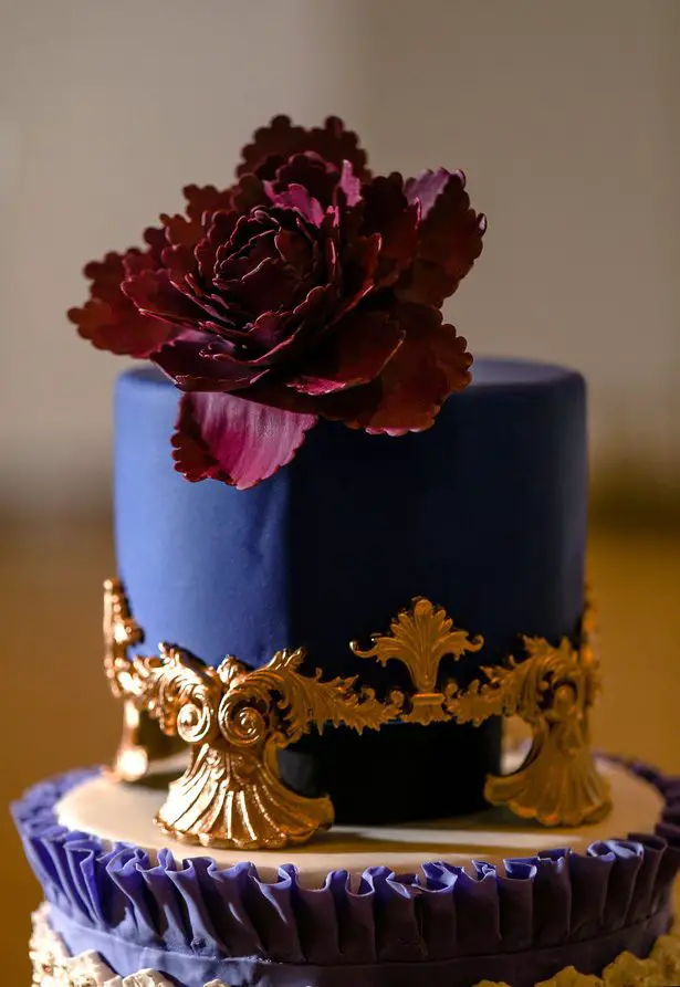 Purple Opuletn Wedding cake with gold details and sugar flowers -Sherri Barber Photography