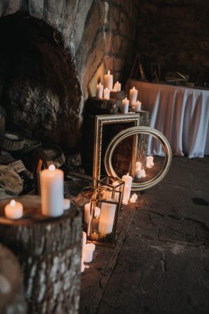 Rustic bohemian wedding decor with frames and candles - Kendra Harper Photography