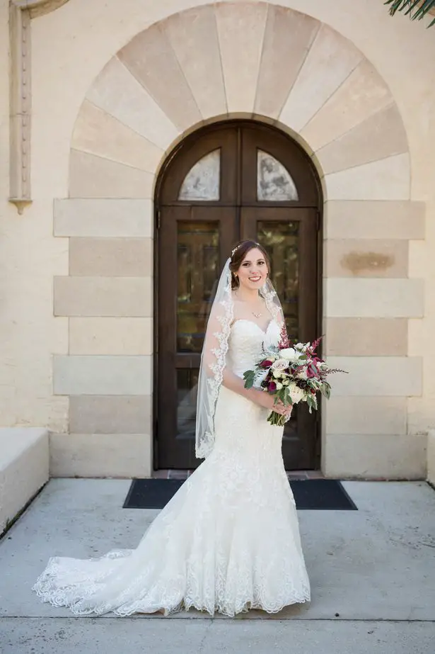 Sophisticated bride with lace strapless mermaid wedding dress- Cat Pennenga Photography