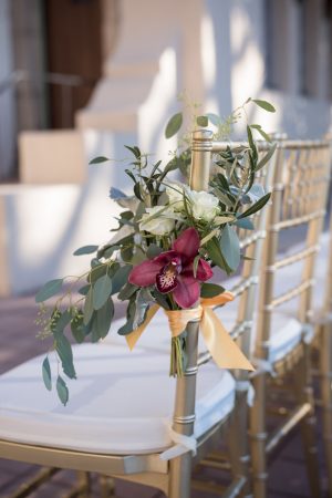 Wedding ceremony flowers for chair decor- Cat Pennenga Photography