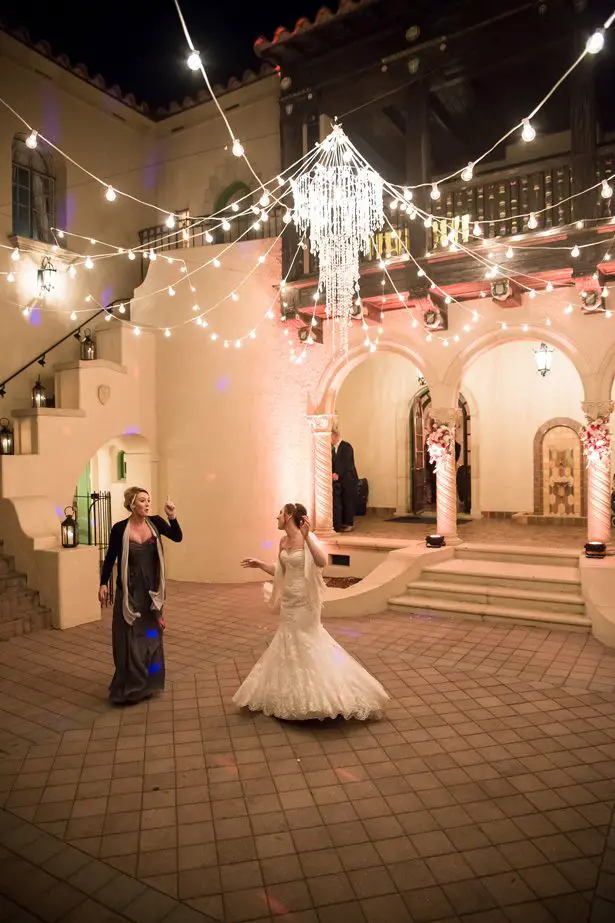 Wedding reception decor with crystal chandelier- Cat Pennenga Photography