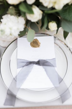 wedding menu with was seal and organza bow - Sarah Sunstrom Photography