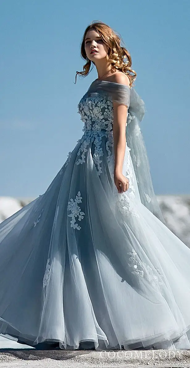 Blue colored wedding dress by CocoMelody
