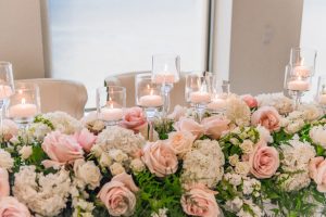 Garland wedding centerpiece with pink and white flowers -Classic Blush Wedding at The Houston Club - Nate Messarra Photography