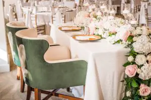 Garland wedding centerpiece with pink and white flowers for sweetheart table -Classic Blush Wedding at The Houston Club - Nate Messarra Photography